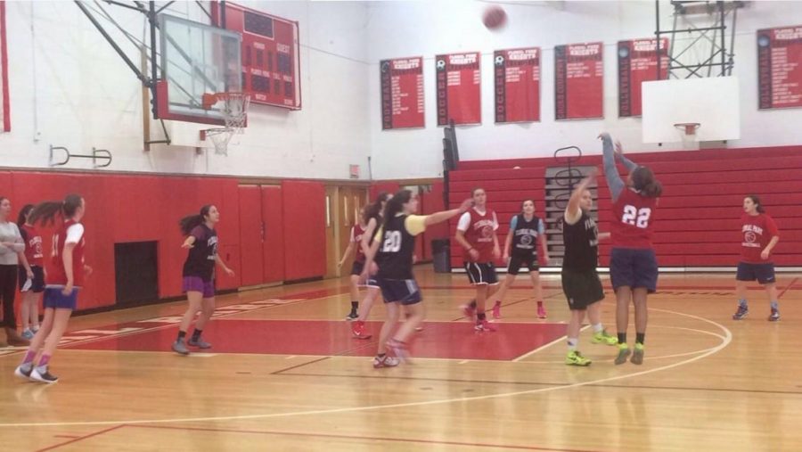 The+girls+varsity+basketball+team+practices+in+preparation+for+its+season+opener+against+Syosset+High+School.